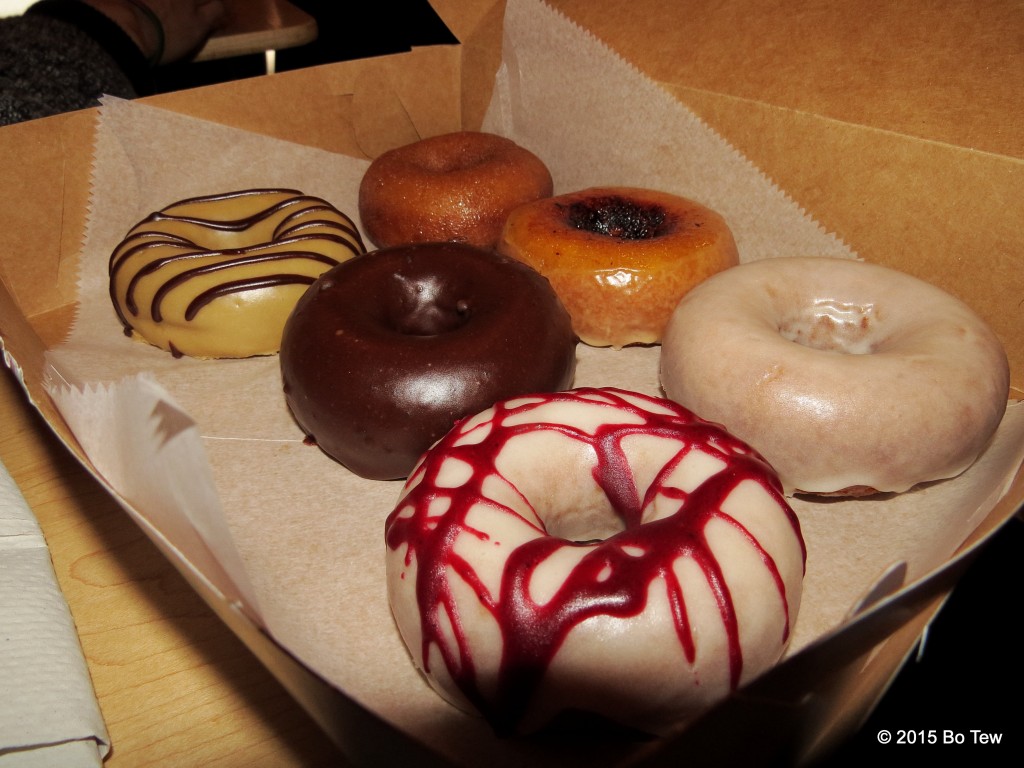 Clockwise from the obvious Peanut butter chocolate (Top left), old fashioned glazed, honey glazed, blueberry Mascarpone, grapefruit brulee and dark chocolate glazed.